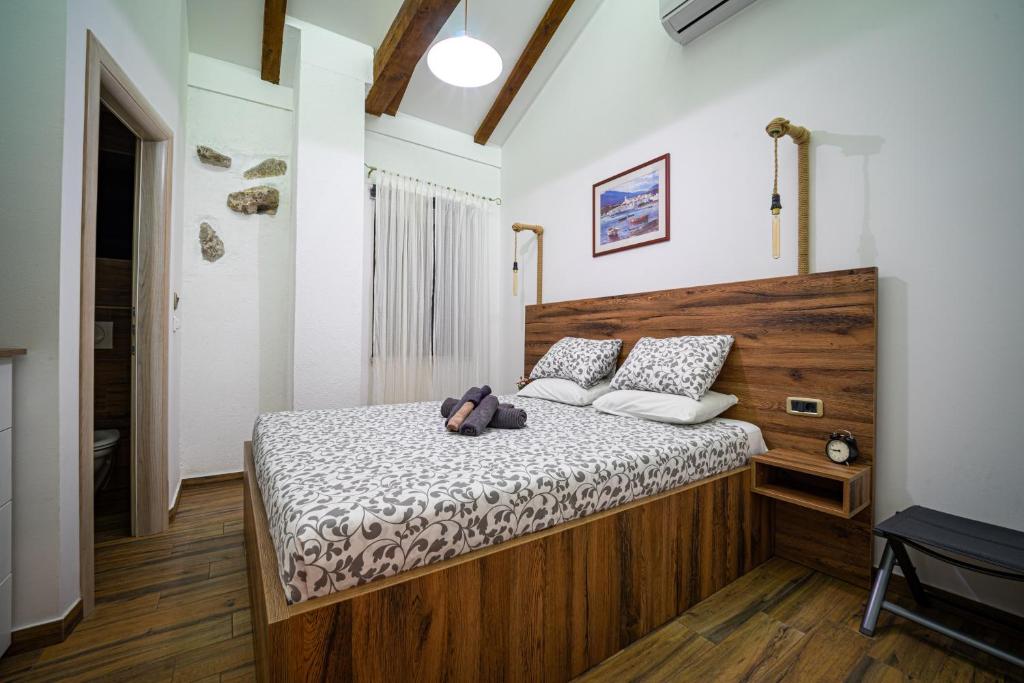 Posteľ alebo postele v izbe v ubytovaní Villa Campiello heated pool