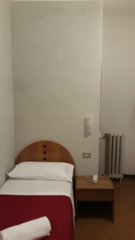 Postel nebo postele na pokoji v ubytování Hotel Tirreno