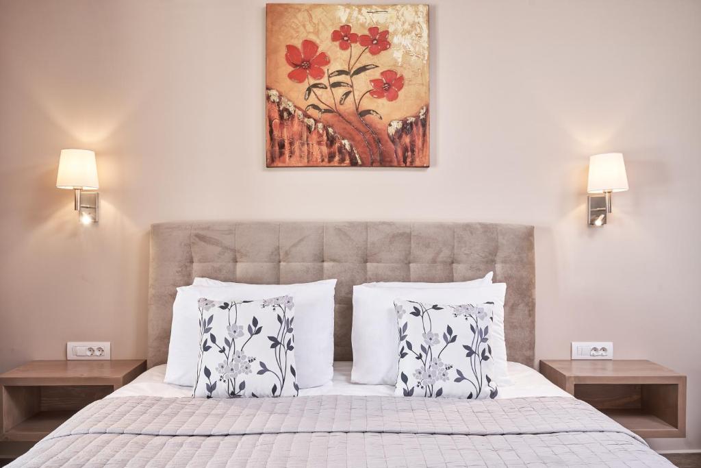 Postel nebo postele na pokoji v ubytování Saint Nicholas Villas