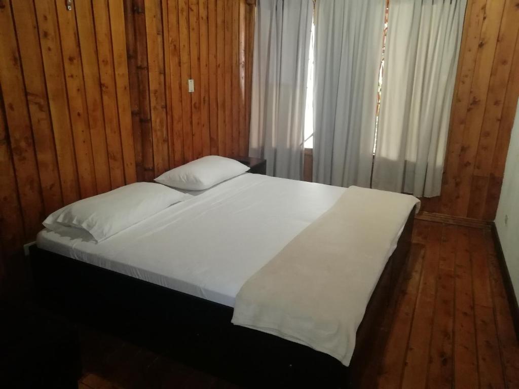 Hotel Pacande B&Bにあるベッド