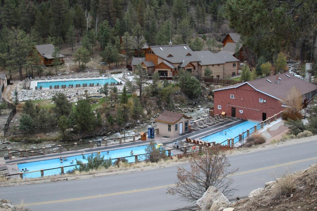 an aerial view of a resort with two swimming pools at Mount Princeton Hot Springs Resort in Buena Vista