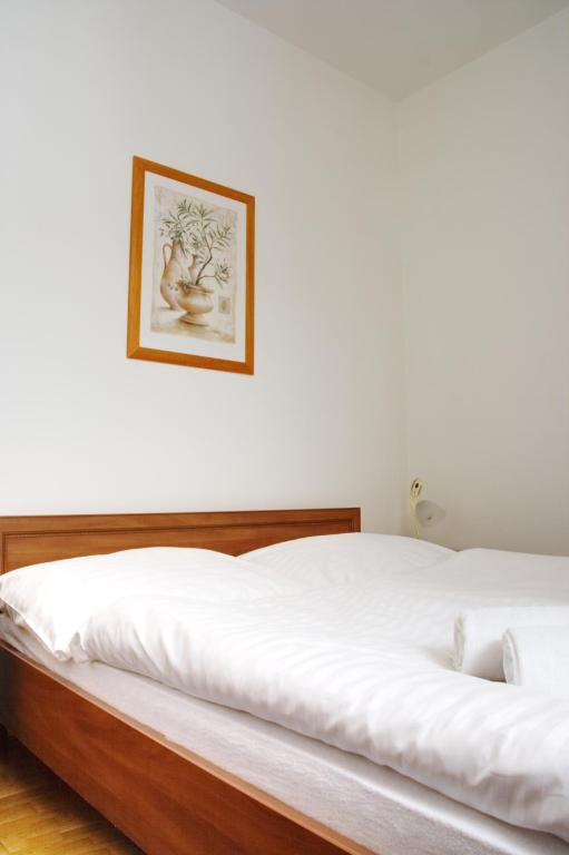 Postel nebo postele na pokoji v ubytování Vila Bellevue