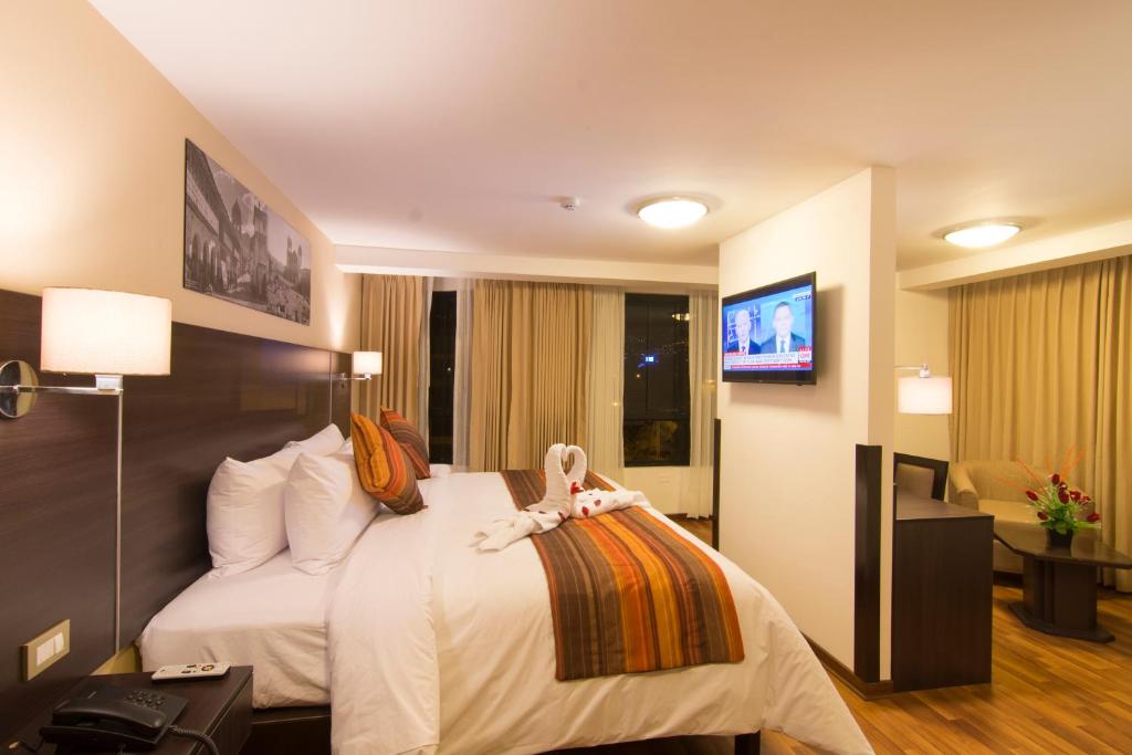 Postel nebo postele na pokoji v ubytování Royal Inn Cusco Hotel