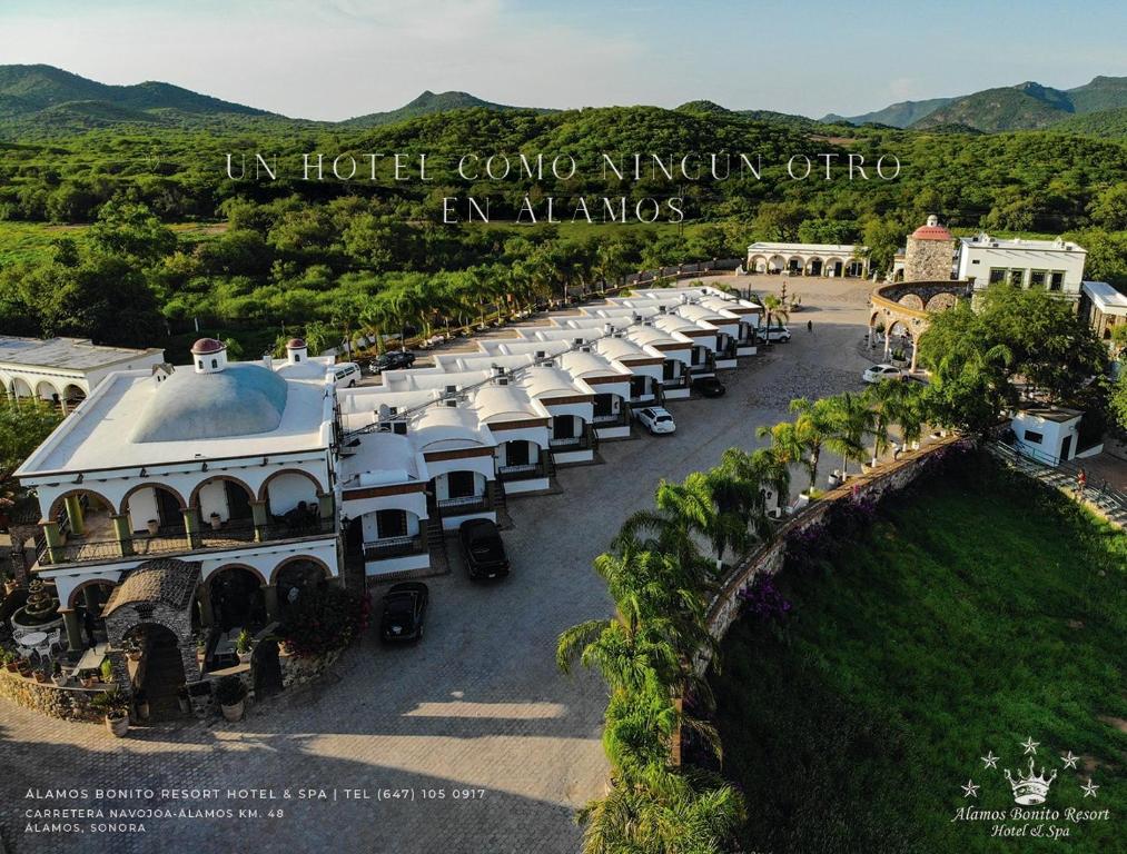 an aerial view of a row of cars parked in a parking lot at Álamos Bonito Resort in Álamos