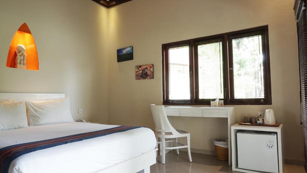 Puri Rinjani Bungalows - 9