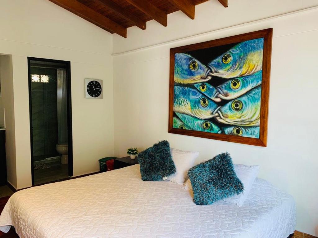Postel nebo postele na pokoji v ubytování Hotel Lleras Premium #1