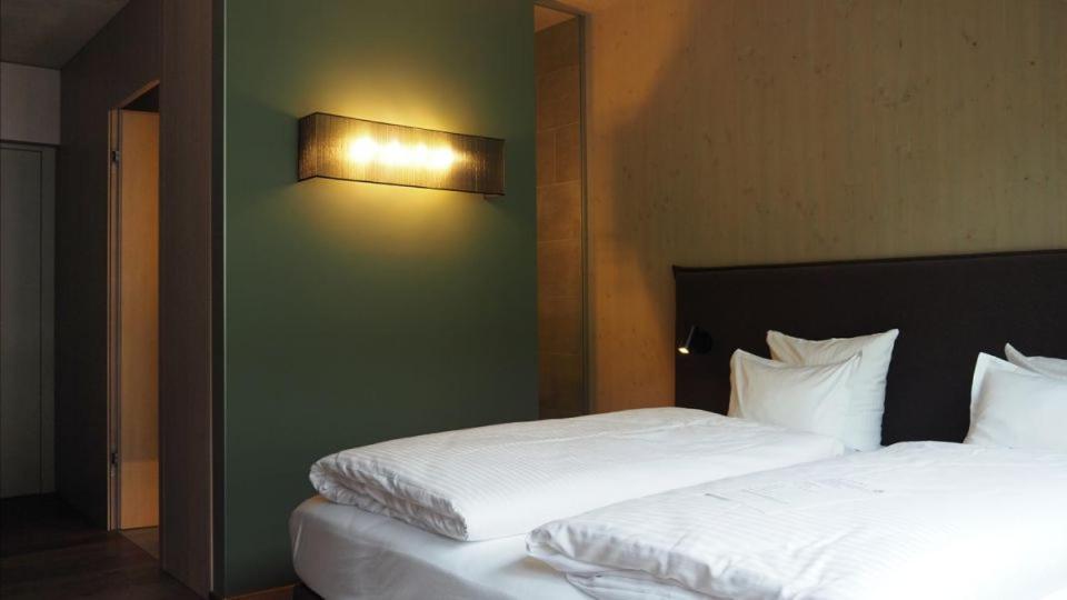 Postel nebo postele na pokoji v ubytování Aktiv-Hotel Sarotla