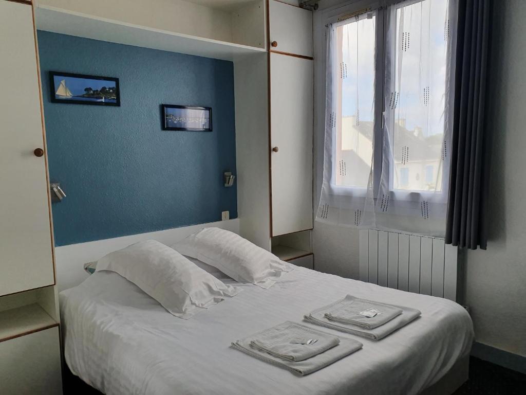 Postel nebo postele na pokoji v ubytování Hôtel Glann Ar Mor