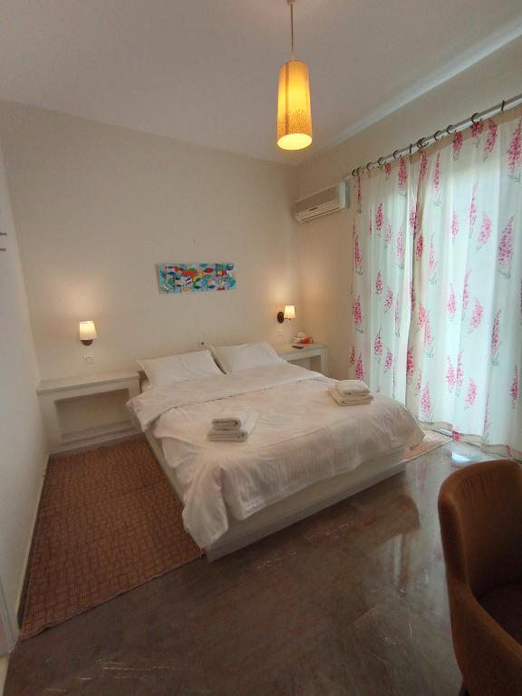 Łóżko lub łóżka w pokoju w obiekcie Zoe Pension