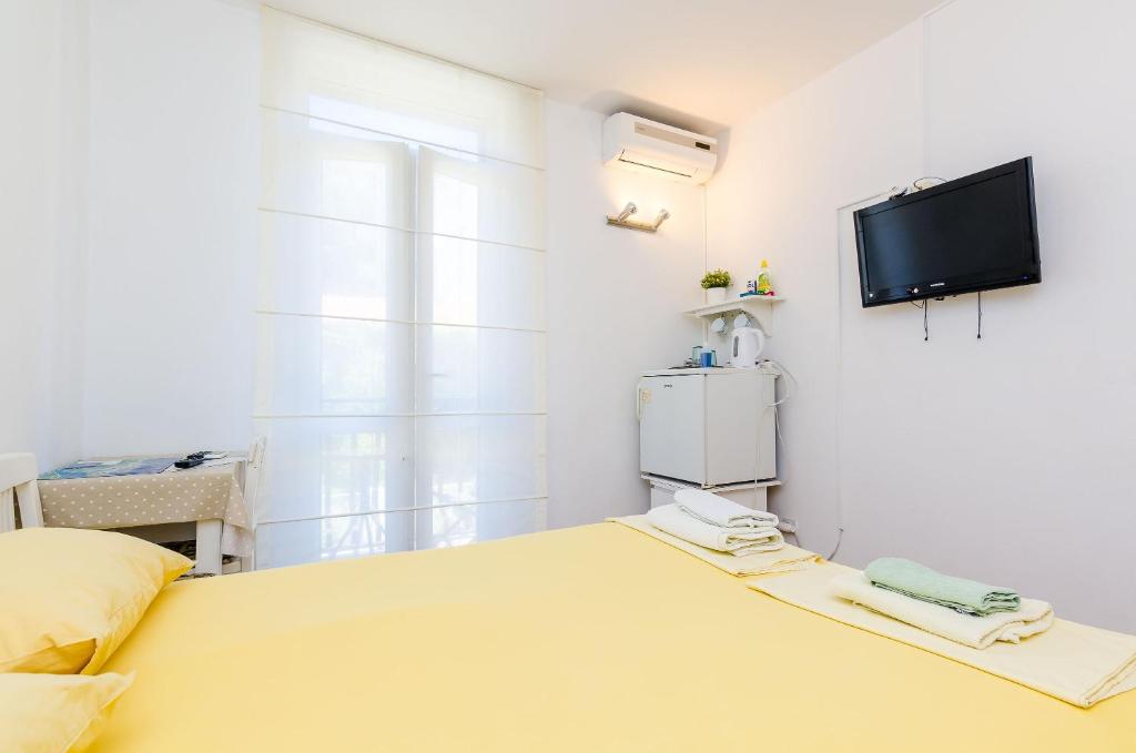 Posteľ alebo postele v izbe v ubytovaní Room Bruna