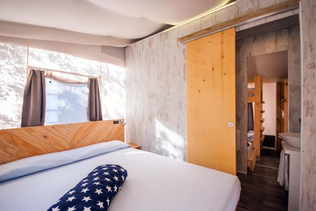 Postel nebo postele na pokoji v ubytování Camping Europa