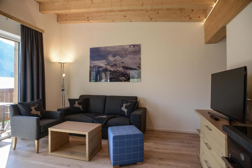 TV a/nebo společenská místnost v ubytování R Appartements Sommerbergbahnen inklusive