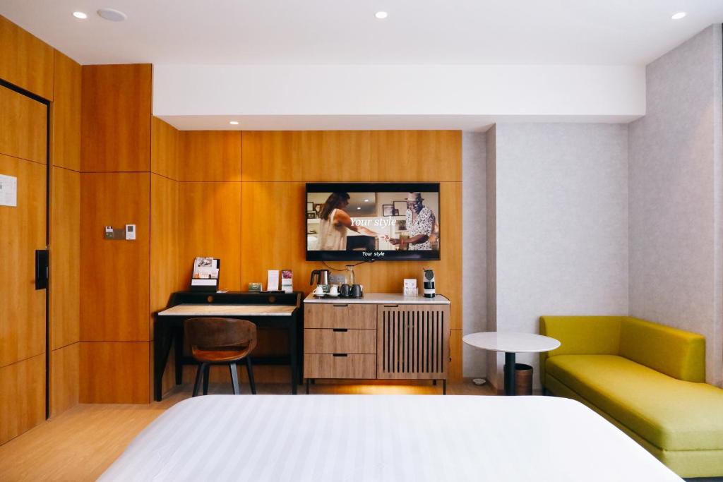 Letto o letti in una camera di Mercure Tangerang BSD City