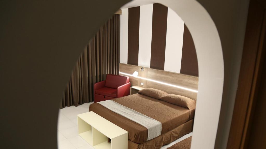 Letto o letti in una camera di Hotel Meranda