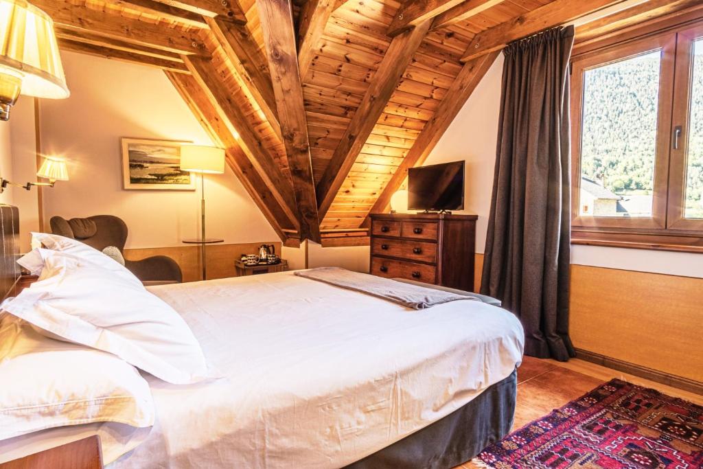 Postel nebo postele na pokoji v ubytování Mauberme Mountain Boutique Hotel