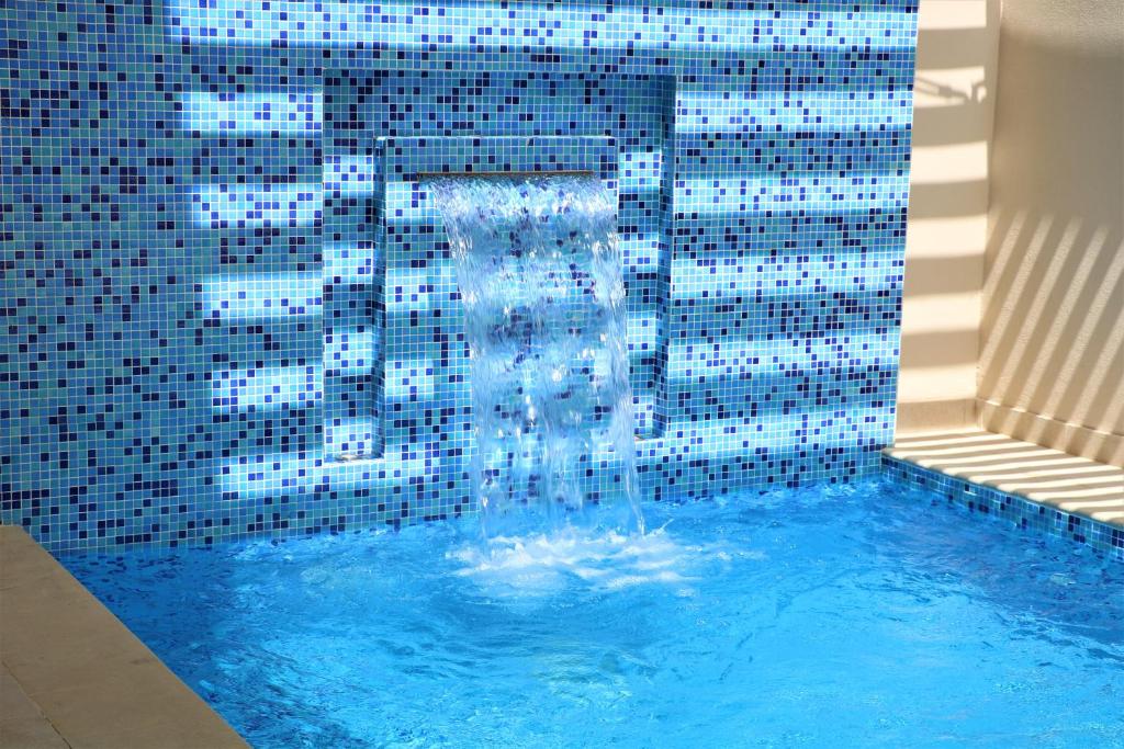 Bazén v ubytování Simaisma A Murwab Resort nebo v jeho okolí