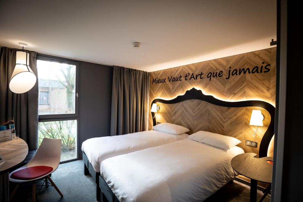 Postel nebo postele na pokoji v ubytování ibis Styles Douai Gare Gayant Expo