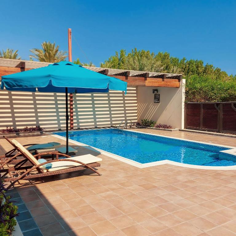 Bazén v ubytování Simaisma A Murwab Resort nebo v jeho okolí