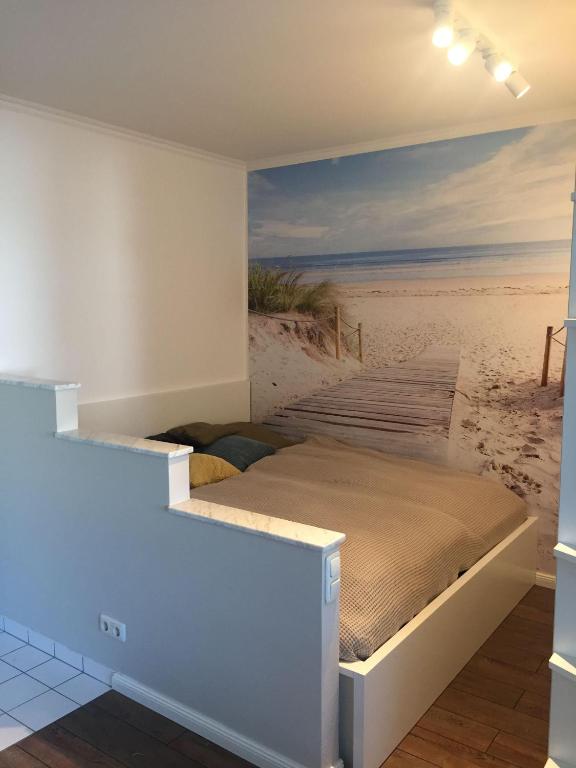 Postel nebo postele na pokoji v ubytování 50 m zum Strand - App Strandhuepfer - Saisonstrandkorb inklusive