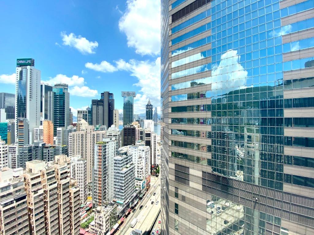 Nespecifikovaný výhled na destinaci Hongkong nebo výhled na město při pohledu z hotelu