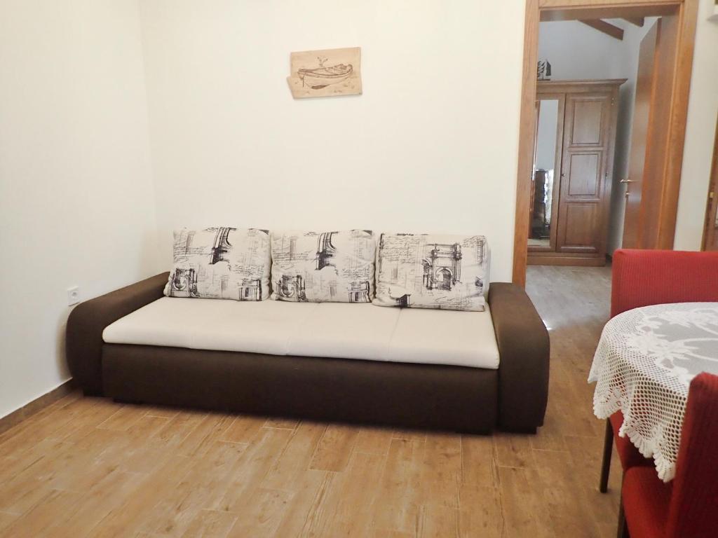 Łóżko lub łóżka w pokoju w obiekcie Holiday home Cvita