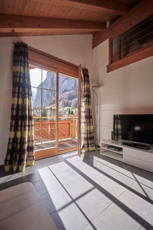 Nespecifikovaný výhled na hory nebo výhled na hory při pohledu z apartmánu