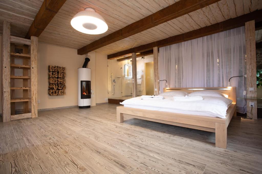 Postel nebo postele na pokoji v ubytování Penzion Vejrovna