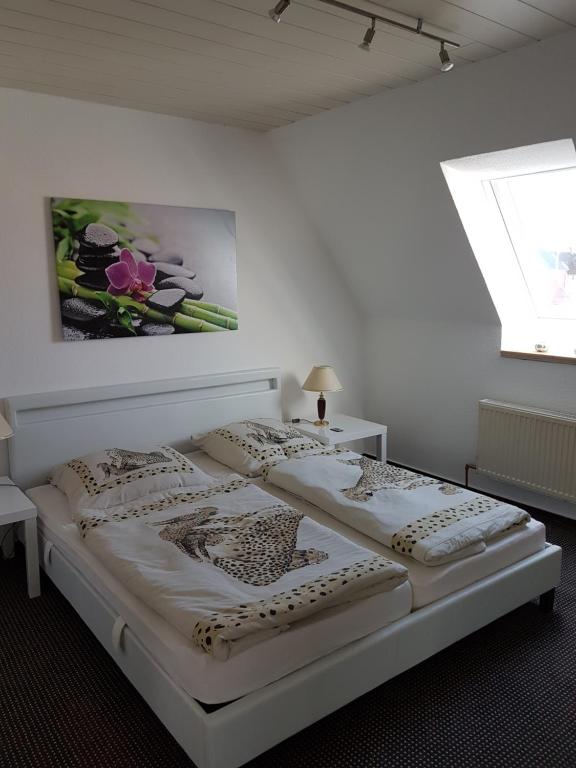 Postel nebo postele na pokoji v ubytování Ferie Apartment Skovby Fyn