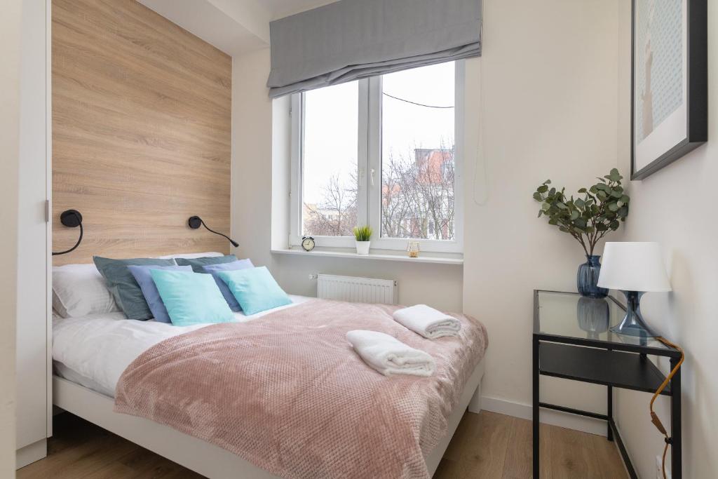 Posteľ alebo postele v izbe v ubytovaní Koszykowa Exquisite Apartment