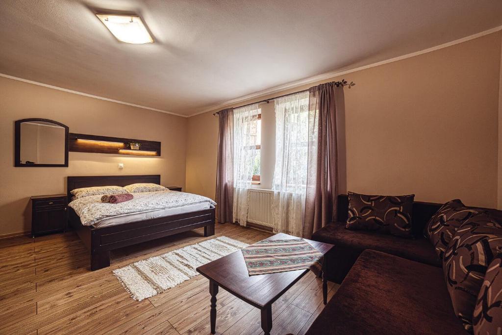 Postel nebo postele na pokoji v ubytování ZET - Penzion & Wellness