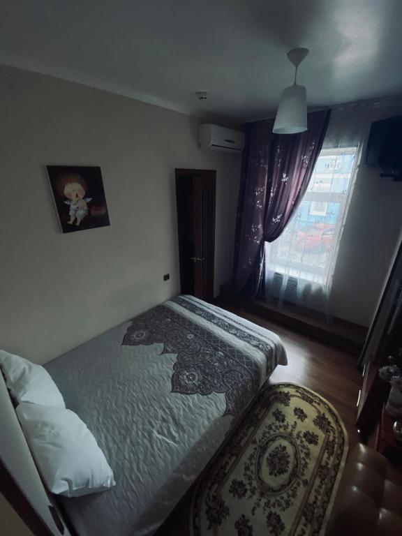 Postel nebo postele na pokoji v ubytování Evropeyskiy