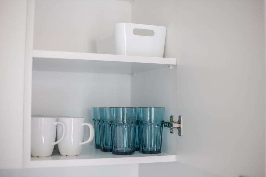 Príslušenstvo na prípravu kávy alebo čaju v ubytovaní Koszykowa Exquisite Apartment
