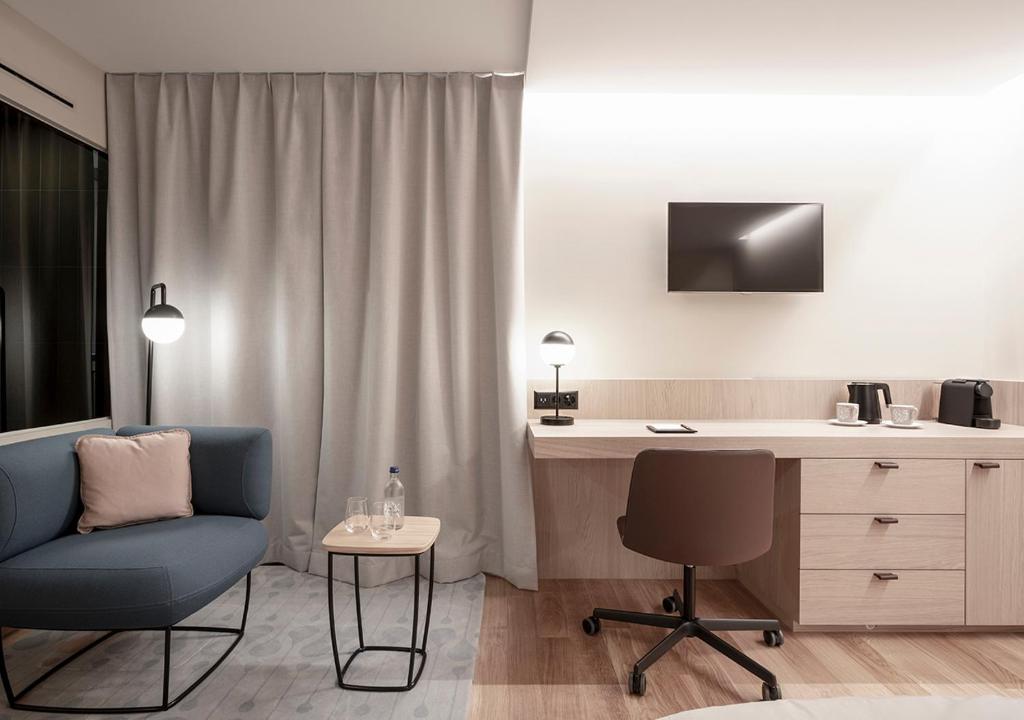 TV a/nebo společenská místnost v ubytování Swissôtel Kursaal Bern