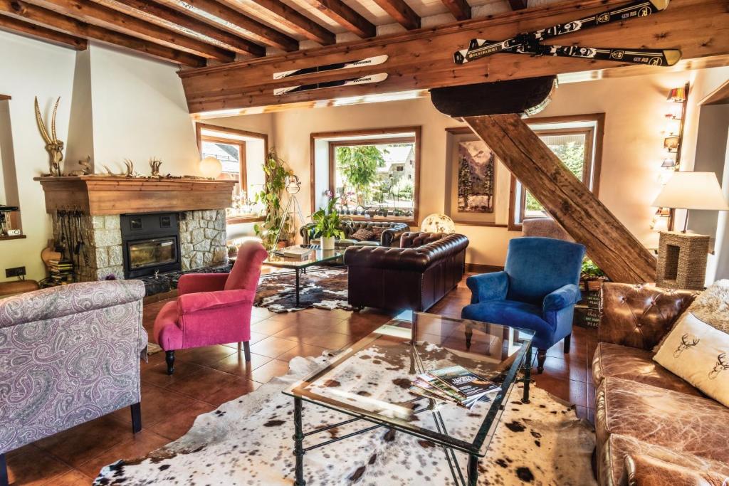 Posezení v ubytování Mauberme Mountain Boutique Hotel