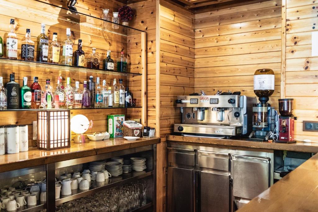 Kuchyň nebo kuchyňský kout v ubytování Mauberme Mountain Boutique Hotel