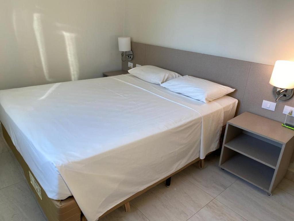 Postel nebo postele na pokoji v ubytování Salinas Park Resort