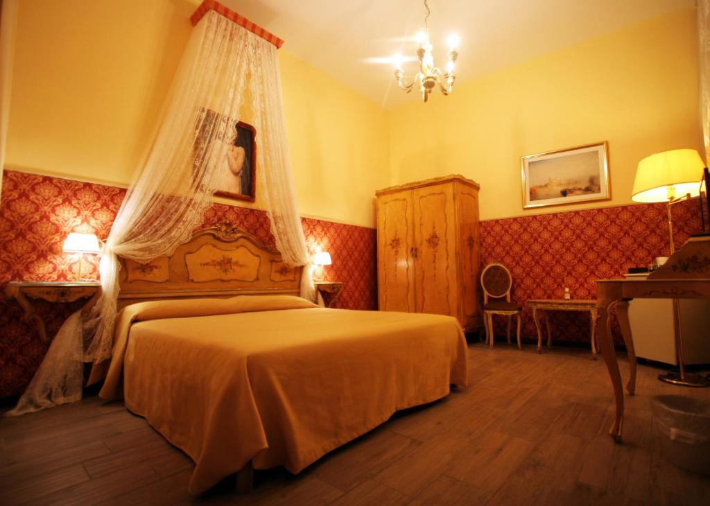 Postel nebo postele na pokoji v ubytování Art Dreams B&B