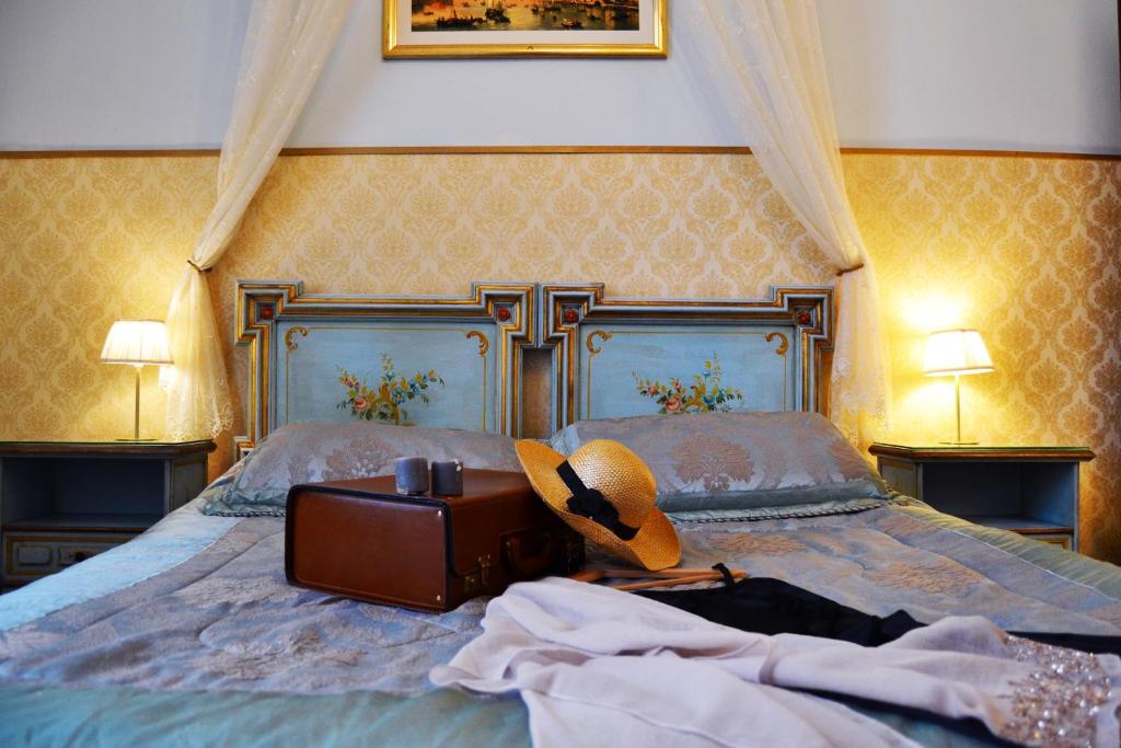 Postel nebo postele na pokoji v ubytování Art Dreams B&B