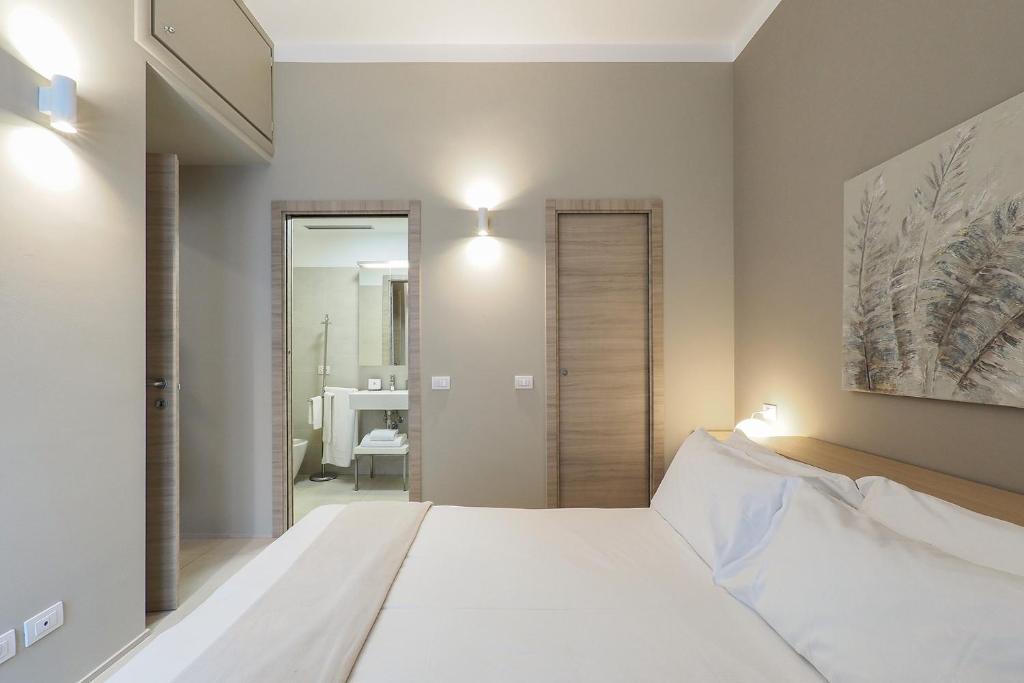 A bed or beds in a room at Contempora Apartments - Cavallotti 13 - B52