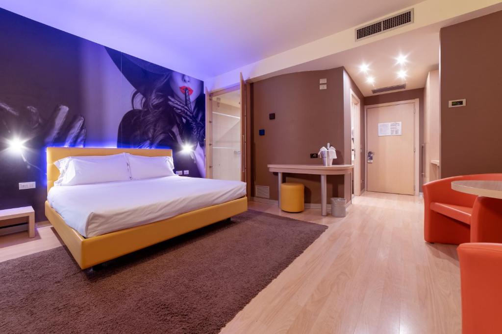 Cama o camas de una habitación en Motel Hotel Piranha