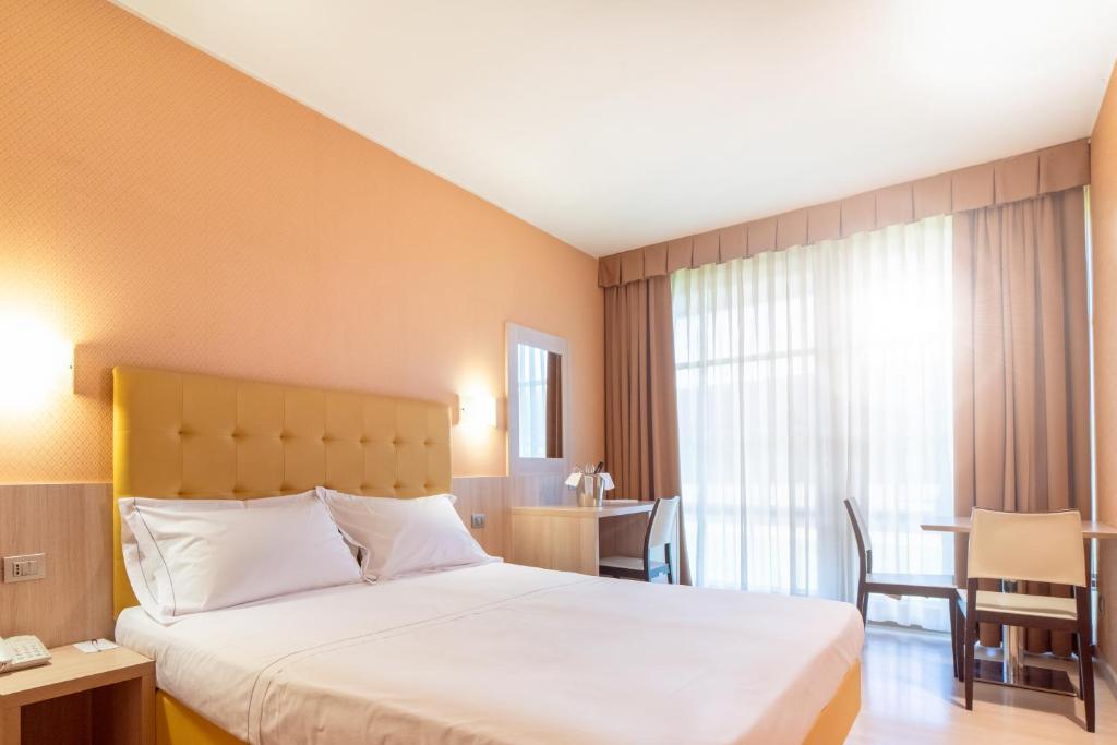 Cama o camas de una habitación en Motel Hotel Piranha