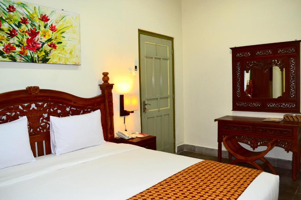 Krevet ili kreveti u jedinici u okviru objekta The Kresna Hotel