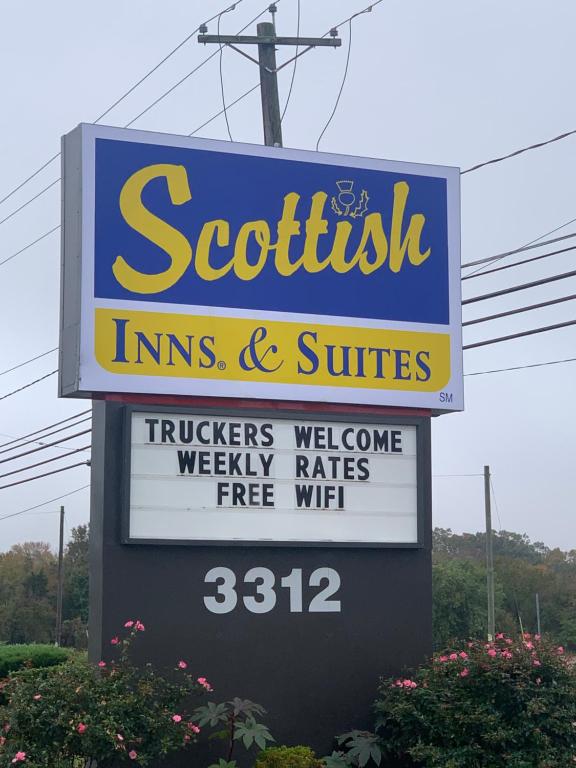 a sign for a sotex incolis and switches at Scottish Inns and Suites- Bordentown, NJ in Bordentown