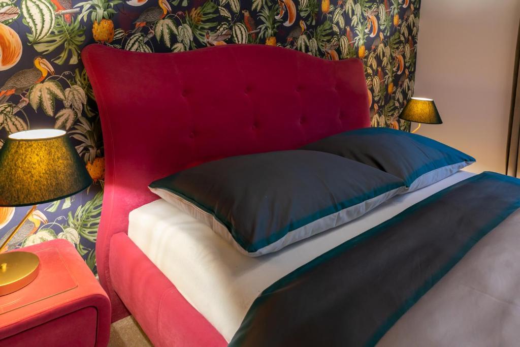 Кровать или кровати в номере Lexor