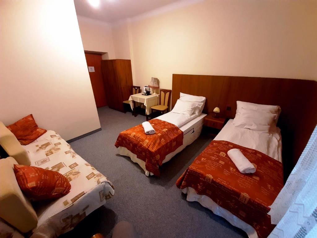 Posteľ alebo postele v izbe v ubytovaní Red Carpet Hostel