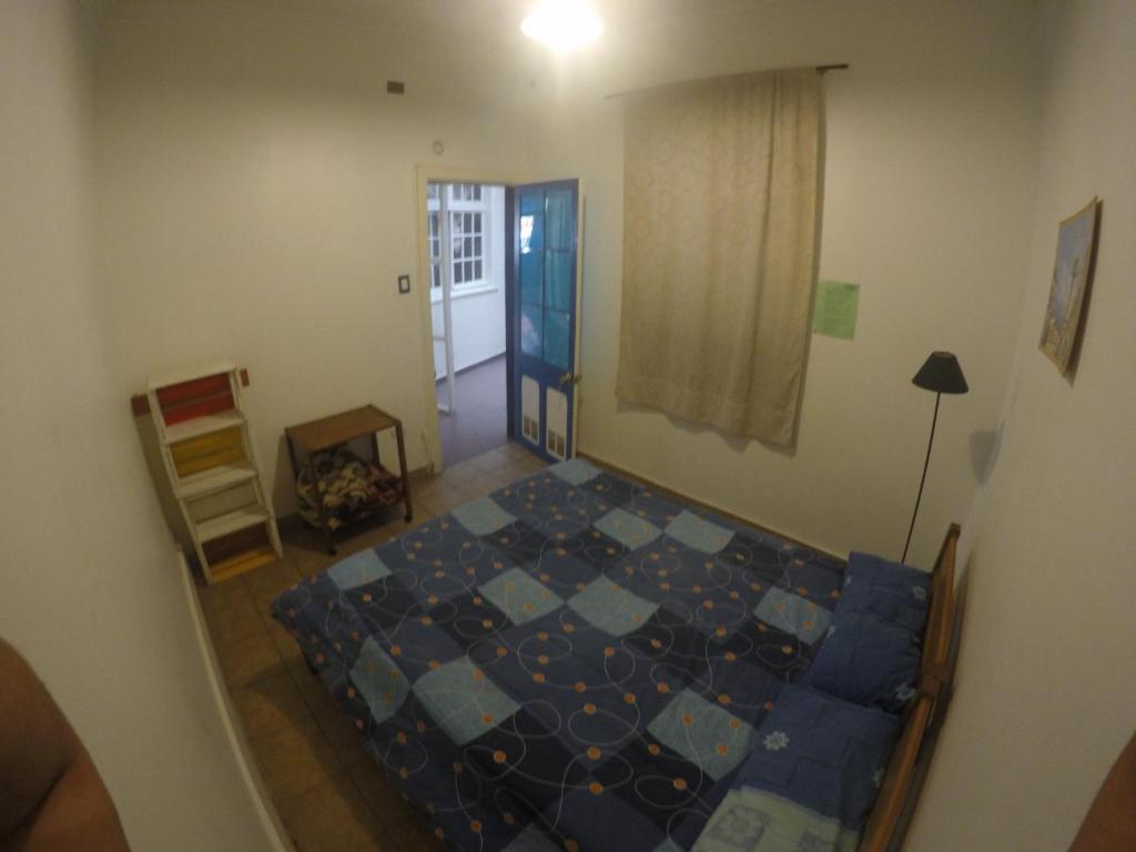 Postel nebo postele na pokoji v ubytování Lemuria Hostel