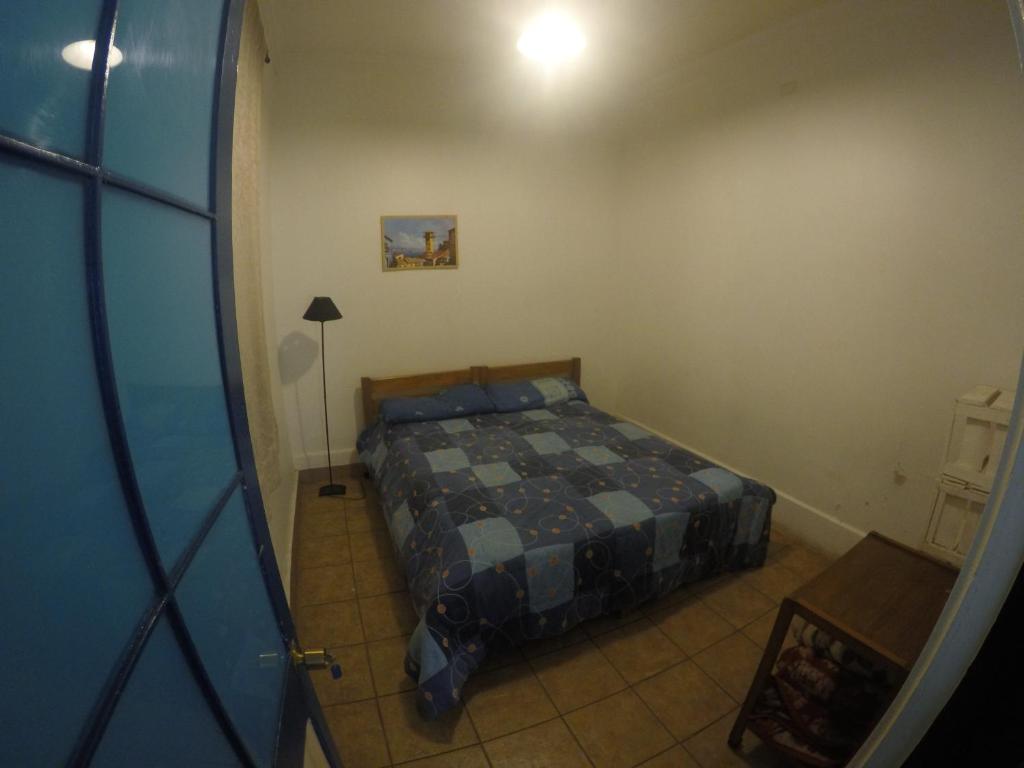 Postel nebo postele na pokoji v ubytování Lemuria Hostel