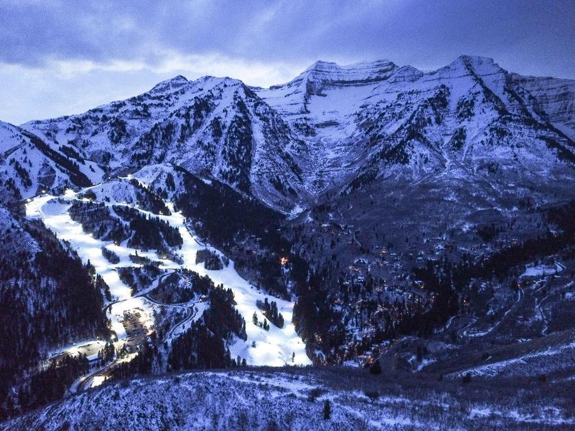 a snow covered mountain range with a snow covered slope at Treehouse On The Stream Sundance, Utah in Sundance