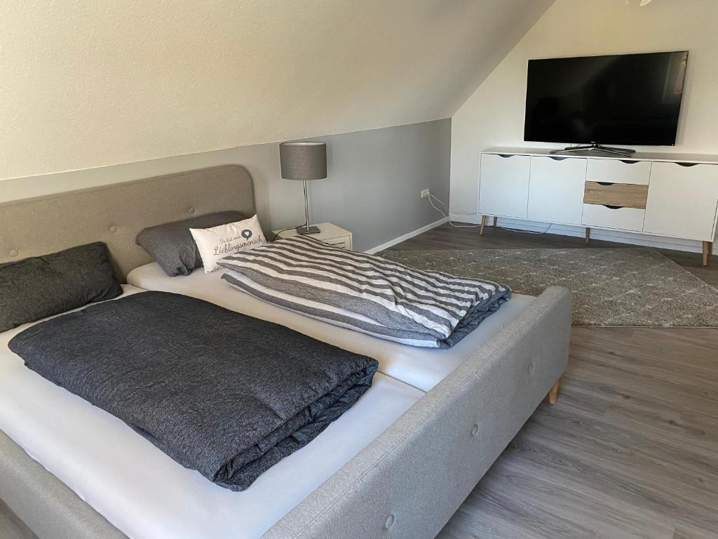 Postel nebo postele na pokoji v ubytování Ferien-am-Uhlenmeer Keine-Monteure