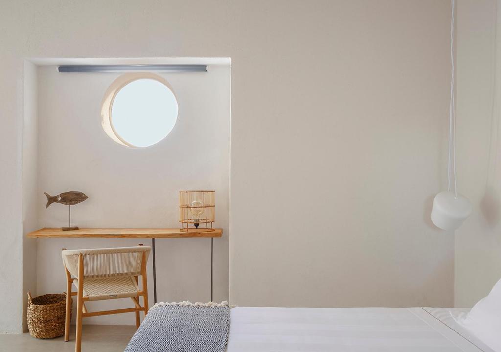 Postel nebo postele na pokoji v ubytování LA GUARDIA Hotel